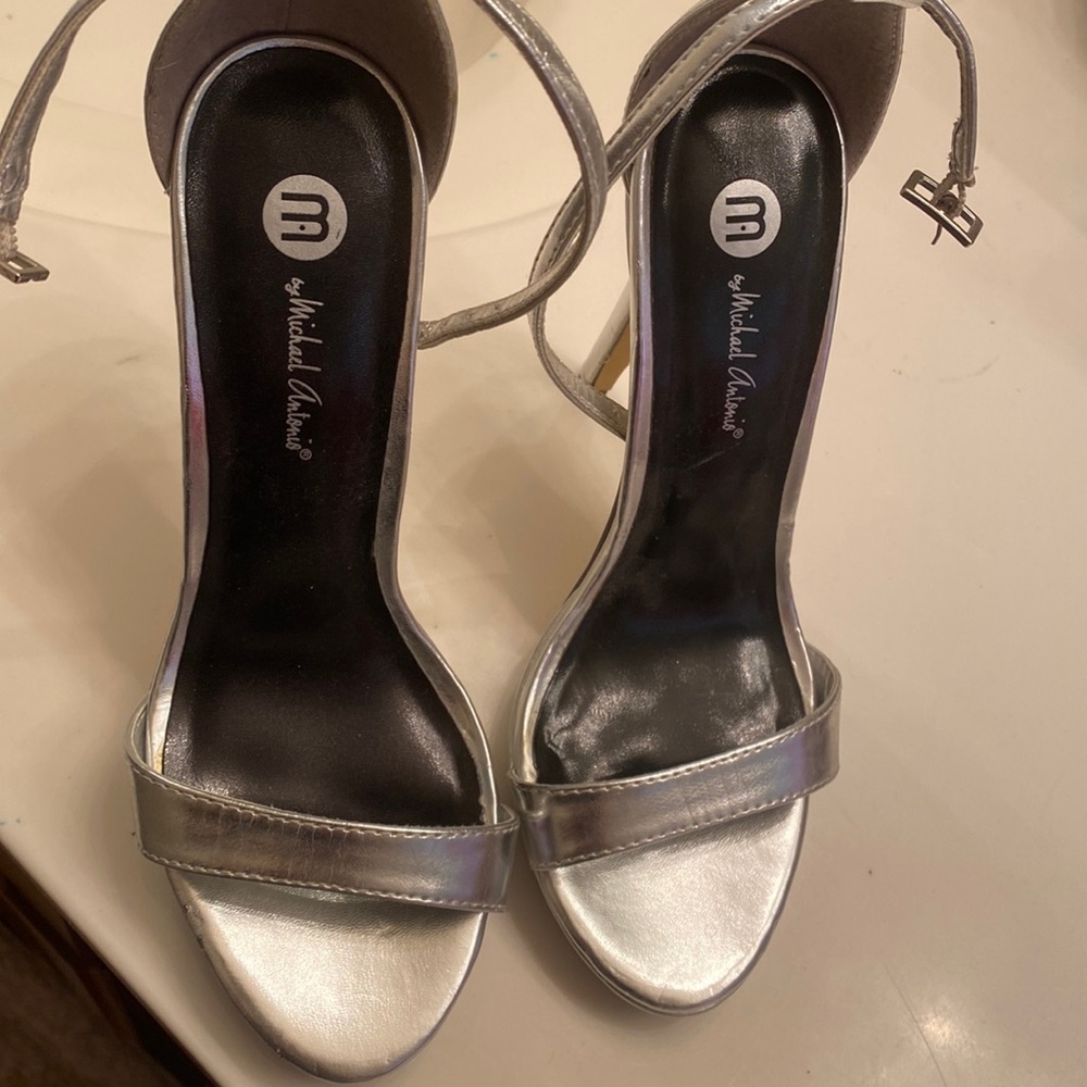 Never used this shoes they are a size 6.5 silver